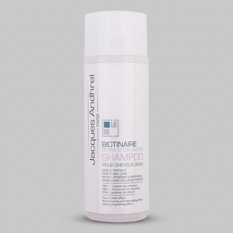 شامپو تقویت کننده مو ژاک آندرل پاریس مدل biotinaire حجم 200 میلی‌لیتر، ضد ریزش، نرم‌کننده، مغذی، مرطوب‌کننده، مناسب موهای چرب، حاوی کمپلکس پرودی اکتیف و عصاره‌های گیاهی